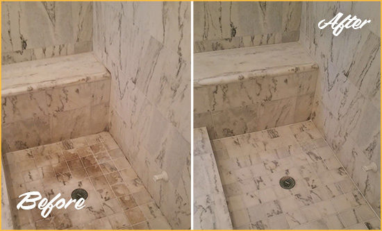 Before and After Picture of a Napa Marble Shower Honed to Remove Dark Stains